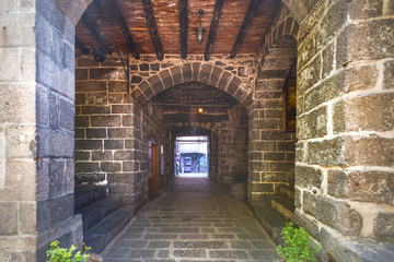 Obraz premium Gate of Suluklu Khan, a medieval inn used for cafes and small shops
