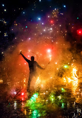 A man dancing with fire. Fireworks man