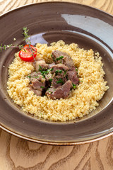 Roasted meat with pearl barley