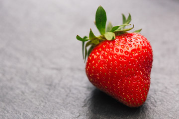 Strawberry isolated dark background