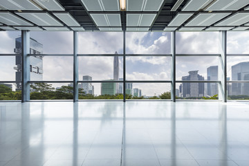 Panoramic skyline and modern business office buildings with empty road,empty concrete square floor