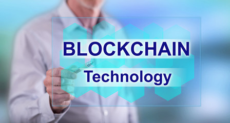 Man touching a blockchain concept
