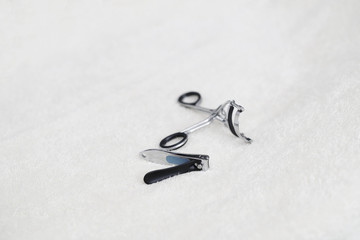 Fototapeta premium Nail cutter and eyelash curler