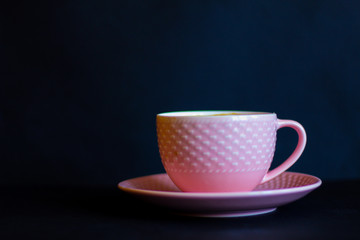 Coffee cup close up, selective focus, dark background, selective focus