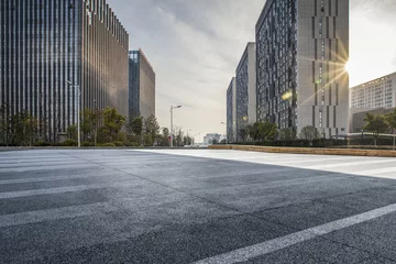 Panoramic skyline and modern business office buildings with empty road,empty concrete square floor