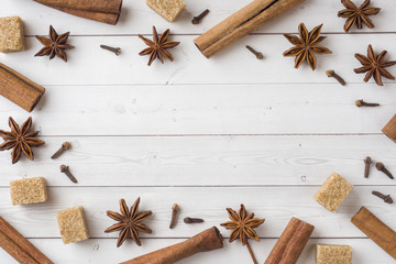 Spicy spices cinnamon, anise and cloves. Ears of wheat, sugar and nuts. Autumn concept