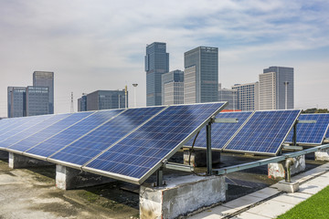 Solar and modern city skyline 