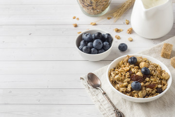 Oat flakes, granules and nuts muesli with blueberries. The concept of healthy food, Breakfast.