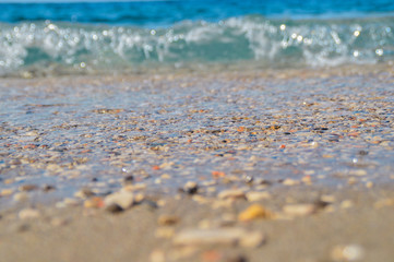 Fototapeta na wymiar Sea beach on a sandy beach and stones