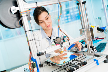 Female College Student Printing 3D Object