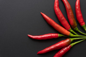 Chili Peppers and black background