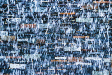 beautifull background  - waterfall in font of stonewall