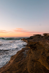 Morning light at the rock cliff along the coastline.