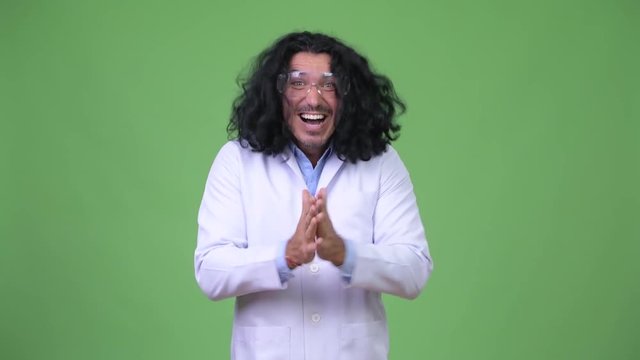 Crazy scientist clapping hands
