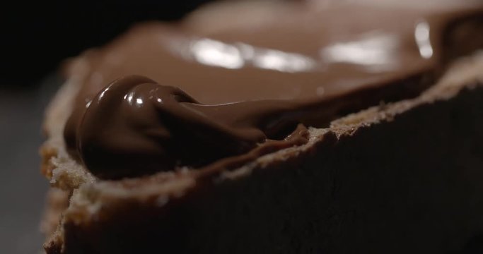 chocolate hazelnut spread on bread close up
