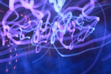 Moving lights on the dark blue background