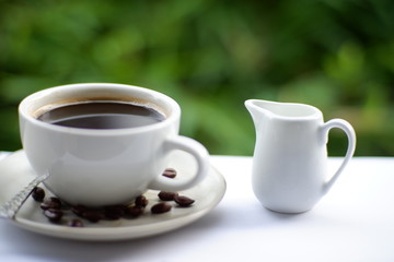 hot coffee on old wooden background