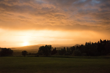 Naklejka na ściany i meble Sonnenuntergang in der Toscana