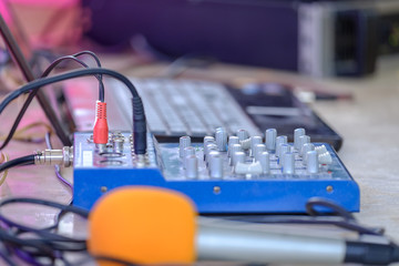 Laptop and mixer on the table