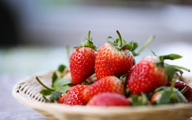 Fresh red strawberry closeup macro blur background