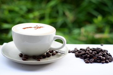 hot coffee on old wooden background