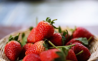 Fresh red strawberry closeup macro blur background