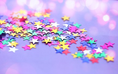 Colors of star decorations abstract blur background