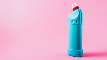 close up view of cleaning fluid, pink background