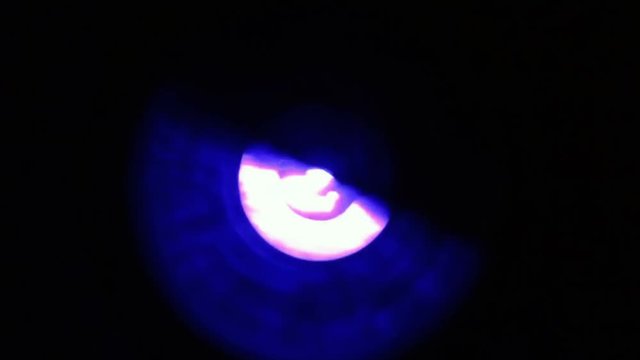 Close-up of soft focused spinning blue LED lights