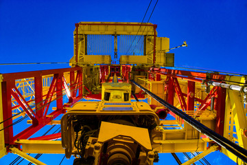 oil rig against the sky with the top drive system
