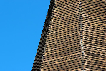 Weathered wooden planks on tower of old church in Voss, Hordaland county, Norway