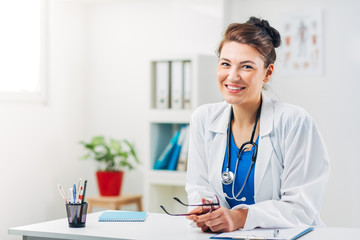 Portrait of Woman Doctor at her Medical Office