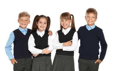 Little children in stylish school uniform on white background