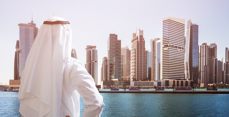 Man Standing In Front Of Dubai Business Bay