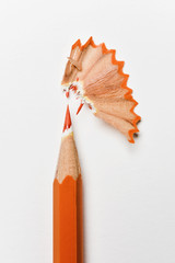 orange pencil crayon and shavings