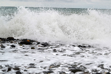 Sea waves running on the beach 