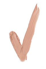 Obraz premium Close up of a make up liquid foundation check mark and Tick symbol isolated on white background.
