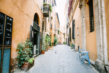 Fototapeta na wymiar Rome city street with old buildings