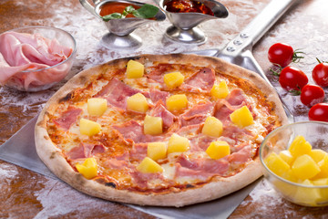 close up of tasty hawaian ham and apple pizza