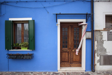 Fototapeta na wymiar Colorful facade, wall in Burano island in Venice