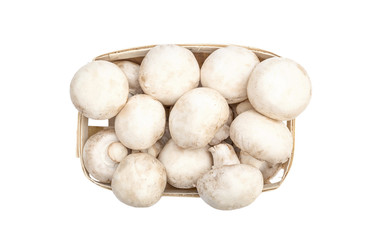 Champignons in wooden box on white background. top view.