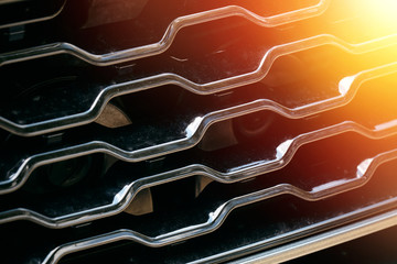 Grid of car with sunflare - obrazy, fototapety, plakaty