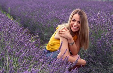Portrait of beautiful woman on the lavender field.