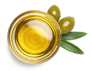 Tuinposter Bowl of olive oil and green olives with leaves © baibaz