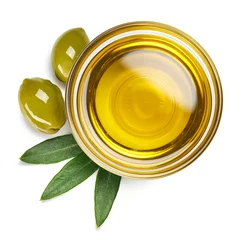 Tuinposter Bowl of olive oil and green olives with leaves © baibaz