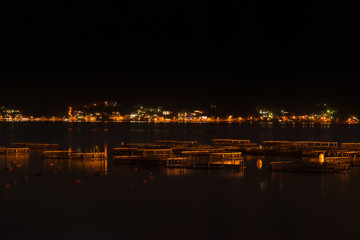 Oyster farm at night