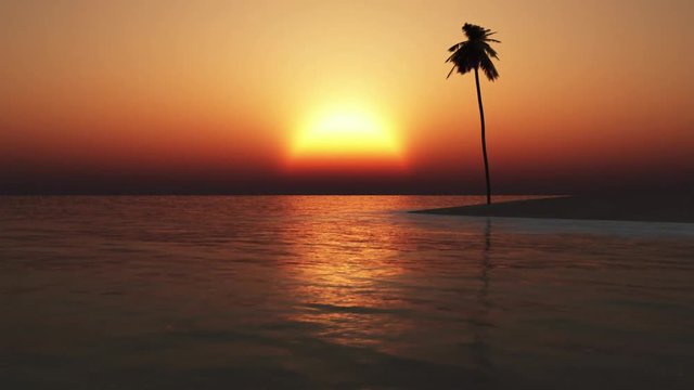 The sun setting in a calm tropical paradise