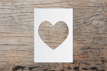 Paper art heart and space for text on wooden background