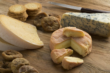 Cheese board with a variety of cheeses close up