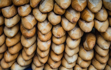 Bread loaves pile background